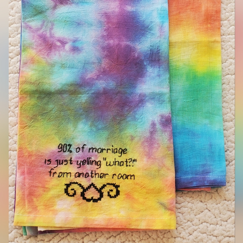 Set of 2 dish towels. One has a saying on it and the other is just tie dye.
